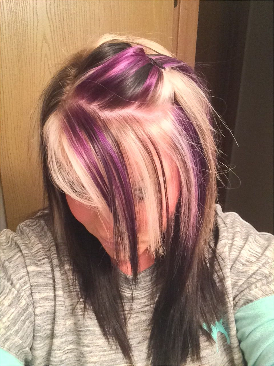 Blonde Hairstyles with Red Underneath Purple Blonde and Black On top with All Black Underneath