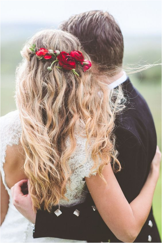 Wedding Hairstyles Half Up Half Down with Flower Red Flower Detail In Wedding Hairstyle with Long Messy Waves