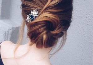 7 Wedding Updo Hairstyles This Pretty Updo Wedding Hairstyle with Hair Accessories Perfect for