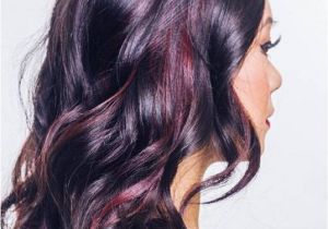 Black Hairstyles with Red Highlights Glossy Black Waves with Muted Burgundy Highlights