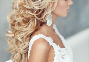 Bride Hairstyles Down Curly From High Volume & Braids to soft Curly Waves with Gorgeous Flowers