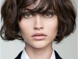Curly Bob Haircuts with Bangs 22 Y Short Hairstyles for Wavy Hair Cool & Trendy