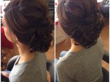 Curly Bun Prom Hairstyles Curly Bun Low Curly Bun Updo Bridal Hair Wedding Hair Prom Hair