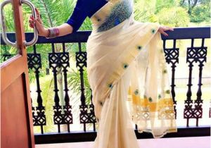 Easy Hairstyles to Do On Saree Kerala Saree Traditional Outfit Peacock Feathers