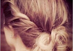 Fast Hairstyles after Shower Give the Messy Bun A Little Makeover by Twisting the Sides and