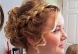 Flower Girl Bun Hairstyles Curly Updo with Chunky Plaits Perfect for Girls with Thick Hair