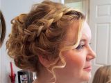 Flower Girl Bun Hairstyles Curly Updo with Chunky Plaits Perfect for Girls with Thick Hair