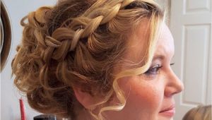 Flower Girl Bun Hairstyles Curly Updo with Chunky Plaits Perfect for Girls with Thick Hair