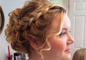 Flower Girl Bun Hairstyles Curly Updo with Chunky Plaits Perfect for Girls with Thick Hair