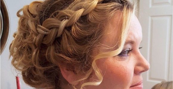 Flower Girl Bun Hairstyles Curly Updo with Chunky Plaits Perfect for Girls with Thick Hair