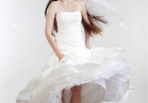 Formal Hairstyles Strapless Dresses Portrait Od A Bride with Long Dark Hair In Wedding Dress isolated