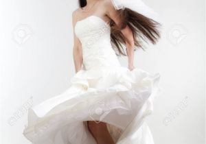 Formal Hairstyles Strapless Dresses Portrait Od A Bride with Long Dark Hair In Wedding Dress isolated