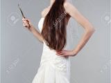 Formal Hairstyles Strapless Dresses Portrait Od A Bride with Long Dark Hair In Wedding Dress isolated