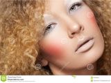 Hairstyles for Curly Hair and Big Nose Creative Style Model with Curly Hair Fun Make Up Stock