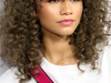 Hairstyles for Curly Hair In Humidity 11 Cute Bang Styles to Try Allure