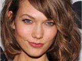 Hairstyles for Curly Hair with Side Bangs Wavy tousled Bob Chin Length Side Bangs"ask for “a Classic Bob