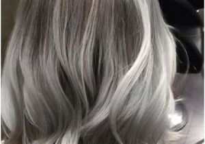 Hairstyles for Dark Hair Going Grey 85 Silver Hair Color Ideas and Tips for Dyeing Maintaining Your