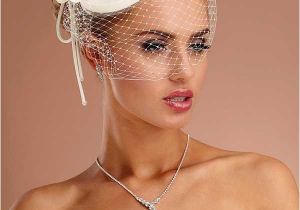 Hairstyles for Wedding Hats Loose Wave Bob with Fascinator Tiny top Hat