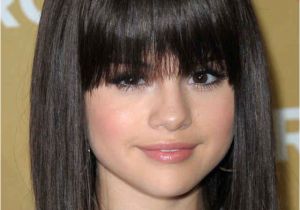 Hairstyles with Bangs On Round Faces the Best and Worst Bangs for Round Face Shapes