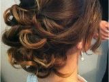 Hairstyles with Buns and Curls Low Curly Bun Hair In 2019