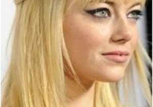 Hairstyles with Half Bangs Emma Stone Half Up Hairstyle with Dramatic Cat Eye and Full Bangs