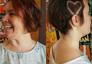 Half Shaved Girl Hairstyles Edgy Short Pixie Bob asymmetrical Side Shaved Vibrant Natural Red