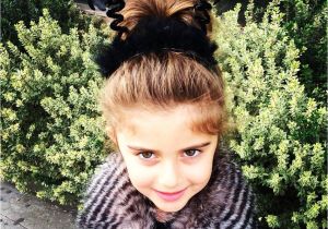 Halloween Hairstyles for Little Girls Spooky Little Girl Hair with Spiders and A High Bun Scrunchie