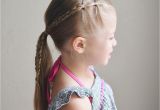 Little Girl Cheer Hairstyles Elastics and Braids Into A Ponytail Teswood Q S Hairdos