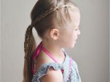 Little Girl Cheer Hairstyles Elastics and Braids Into A Ponytail Teswood Q S Hairdos