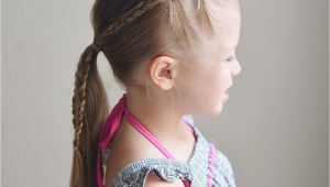 Little Girl Cheer Hairstyles Elastics and Braids Into A Ponytail Teswood Q S Hairdos