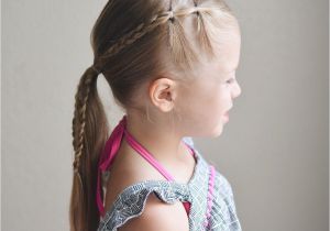 Little Girl Cheer Hairstyles Elastics and Braids Into A Ponytail Teswood Q S Hairdos