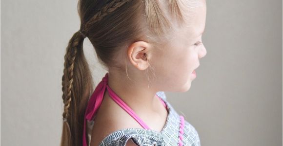 Little Girl Cheer Hairstyles Elastics and Braids Into A Ponytail Teswood Q S Hairdos