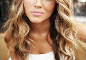 Loose Curl Hairstyles for Wedding Try A Loose Curl and Flower Halo for A Bohemian Look