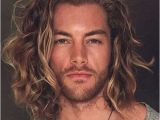 Medium Length Haircuts for Men with Thick Hair 50 Smooth Wavy Hairstyles for Men Men Hairstyles World