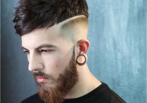 Mens Haircuts with Lines Undercut Fade Hairstyle with Long Bangs