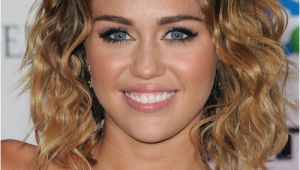 Miley Cyrus Bob Haircut Miley Cyrus Medium Wavy Casual Bob Hairstyle Dark Brunette