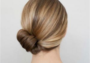 Simple Roll Hairstyles Sweep Your Strands to One Side Roll Your Ends Up to Create A