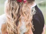 Wedding Hairstyles Half Up with Flowers Red Flower Detail In Wedding Hairstyle with Long Messy Waves