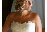 Wedding Hairstyles Long Hair Down with Veil Romantic Bridal Hair Low Updo Curls with Veil Hairstyle by Dana