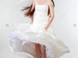 Wedding Hairstyles Real Brides Portrait Od A Bride with Long Dark Hair In Wedding Dress isolated